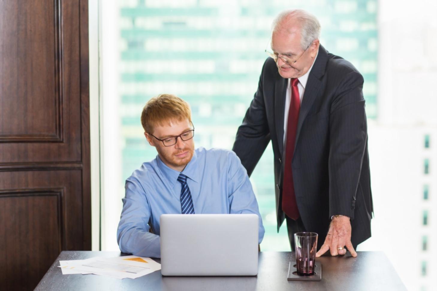Person reviewing a business document with a critical eye